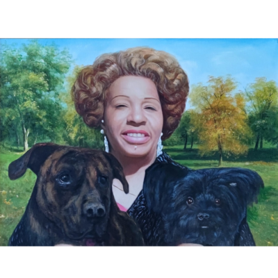 two dogs and a lady in garden